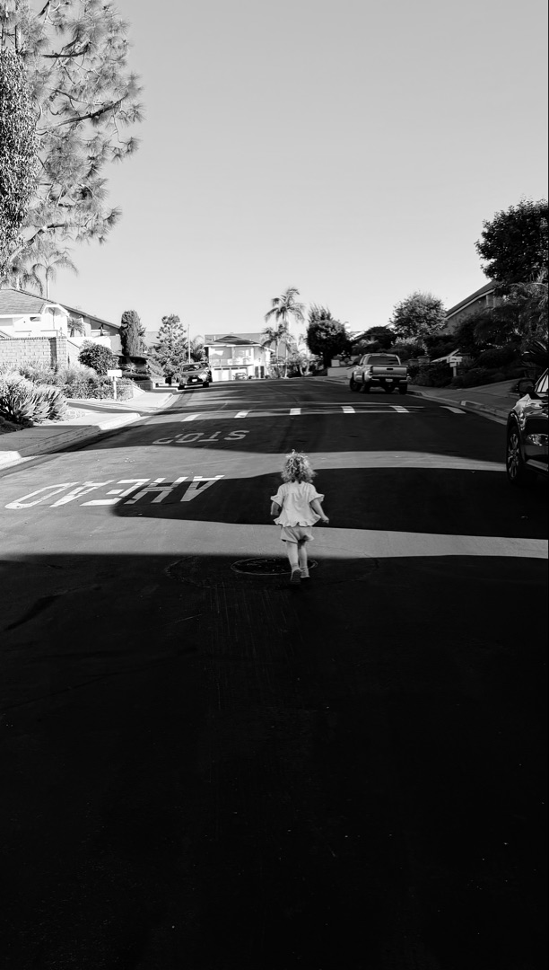 Man near graffiti wall, cinematic street portrait