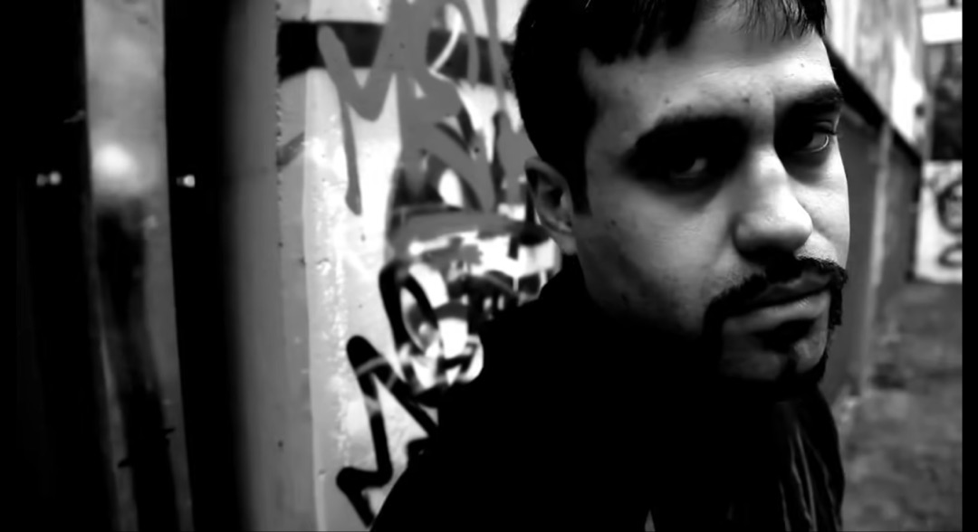 Adidas slides on patterned textile