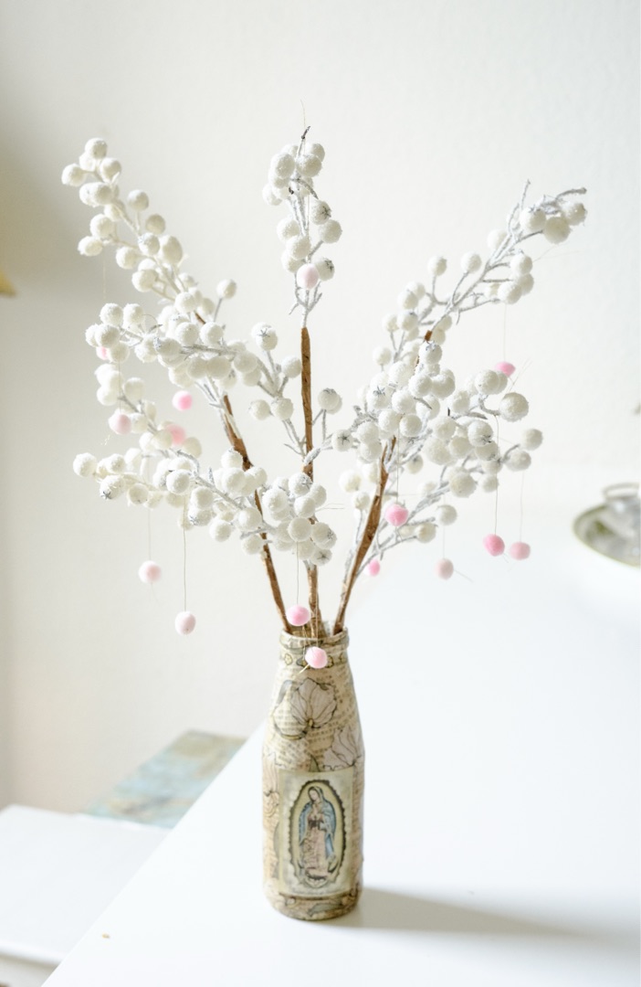 Decorative vase with white berries